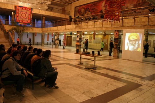 view of part of exhibition in Zaporozhye, with video projector on the
right side. Many people were attracted with multimedia shows and video
films about India.