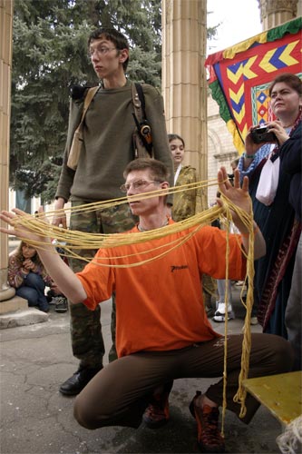 Gopishvar Prabhu is holding threads for newly-initiated brahmins.